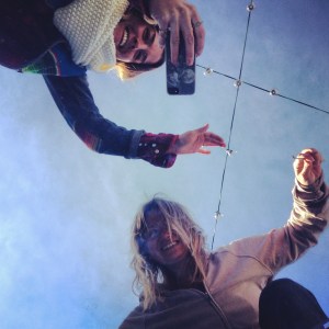 With fellow mosaic artist, Tori Klopfer.  Preparing to break a large mirror avoided shattered bad luck by using glass cutter.